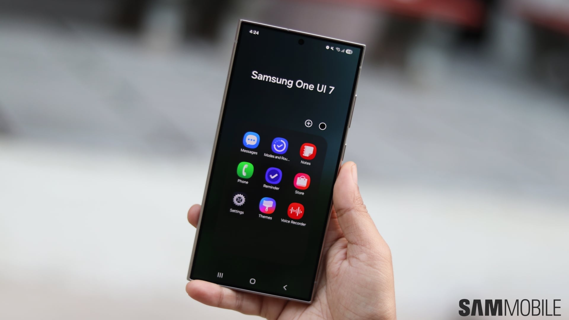 Image of a phone running One UI 7 with the new app icons on the display